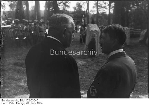 Adolf Hitler in conversation with Konstantin von Neurath at the reburial of Carin Göring in Carinhall